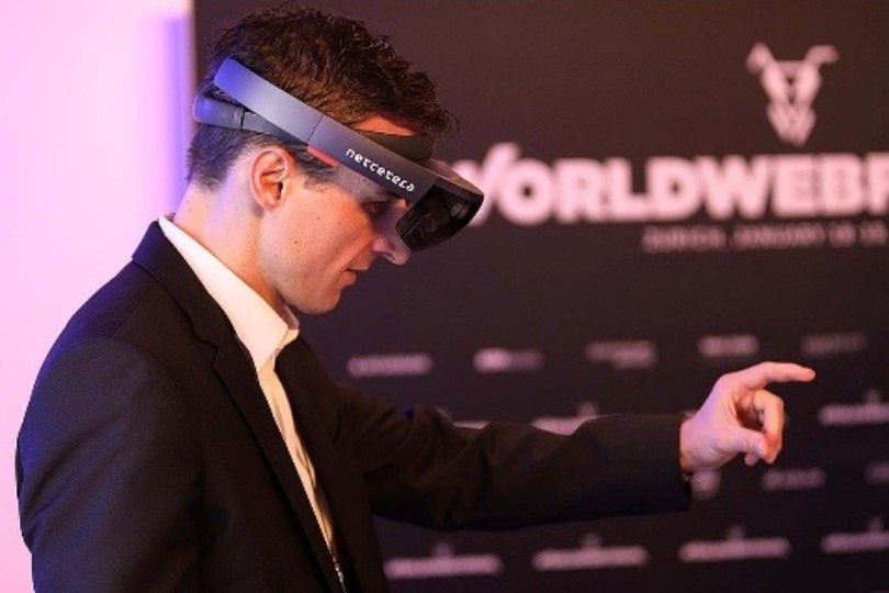 A visitor tries the HoloLens, Microsoft’s mixed reality headset
